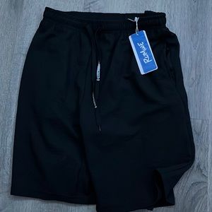 Plain black Adult Small Romwe shorts, still has tags.